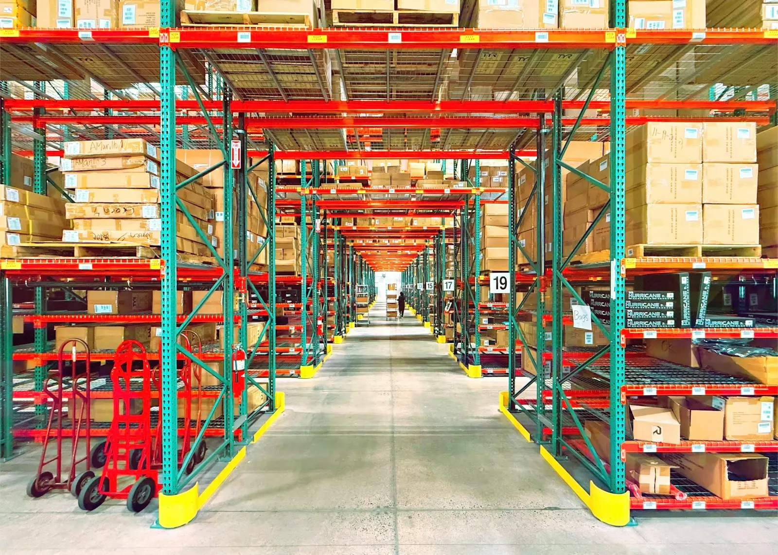 Warehouse racking aisle with high shelving